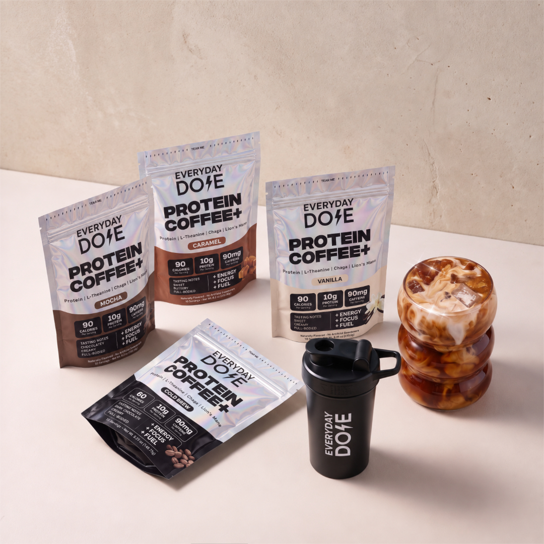 Everyday Dose Protein Coffee+ range with shaker bottle and stacked bubble glass