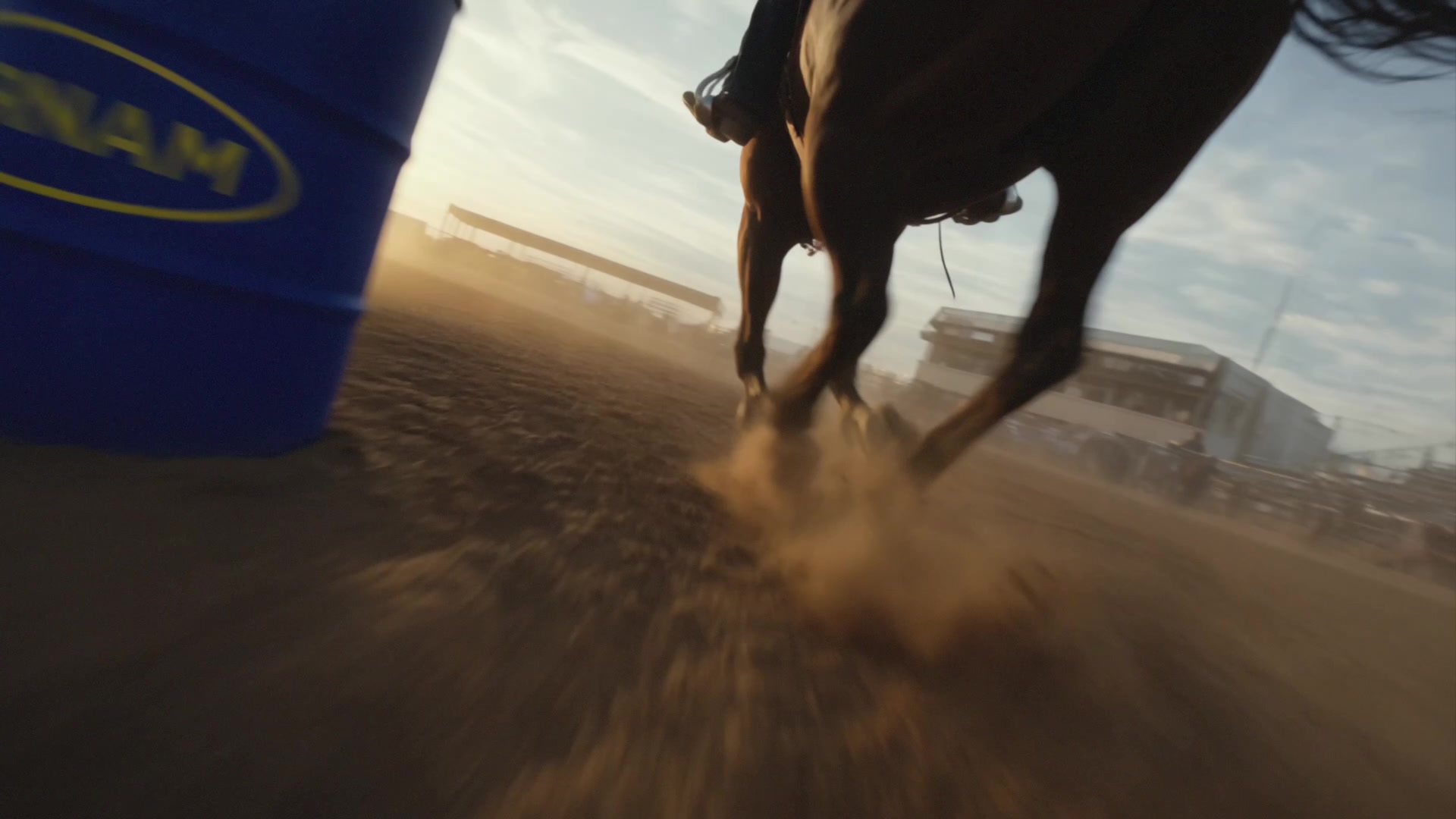 Farnam Apple Elite - Ground-level shot of hooves driving past the Farnam barrel