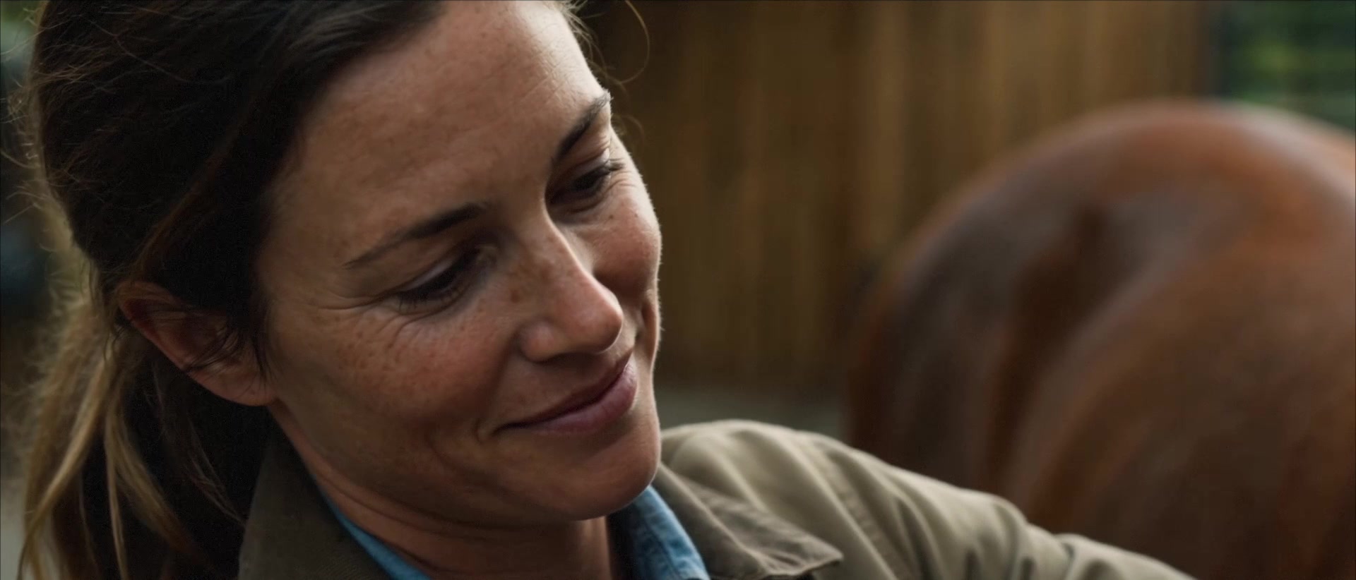 Farnam Endure Gold - Close-up of a horse owner smiling beside her horse